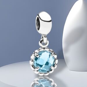 Pandora Sterling Silver Cool Breeze Dangle Bead Charm With Blue Topaz Retired